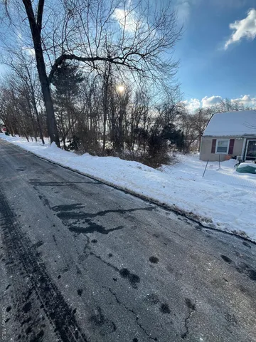 a view of road with covered with snow