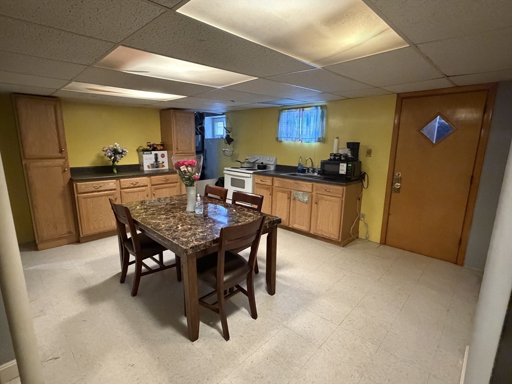 34 Adams Avenue Saugus, MA 01906 - Photo 4 of 8 a view of a dining room with furniture