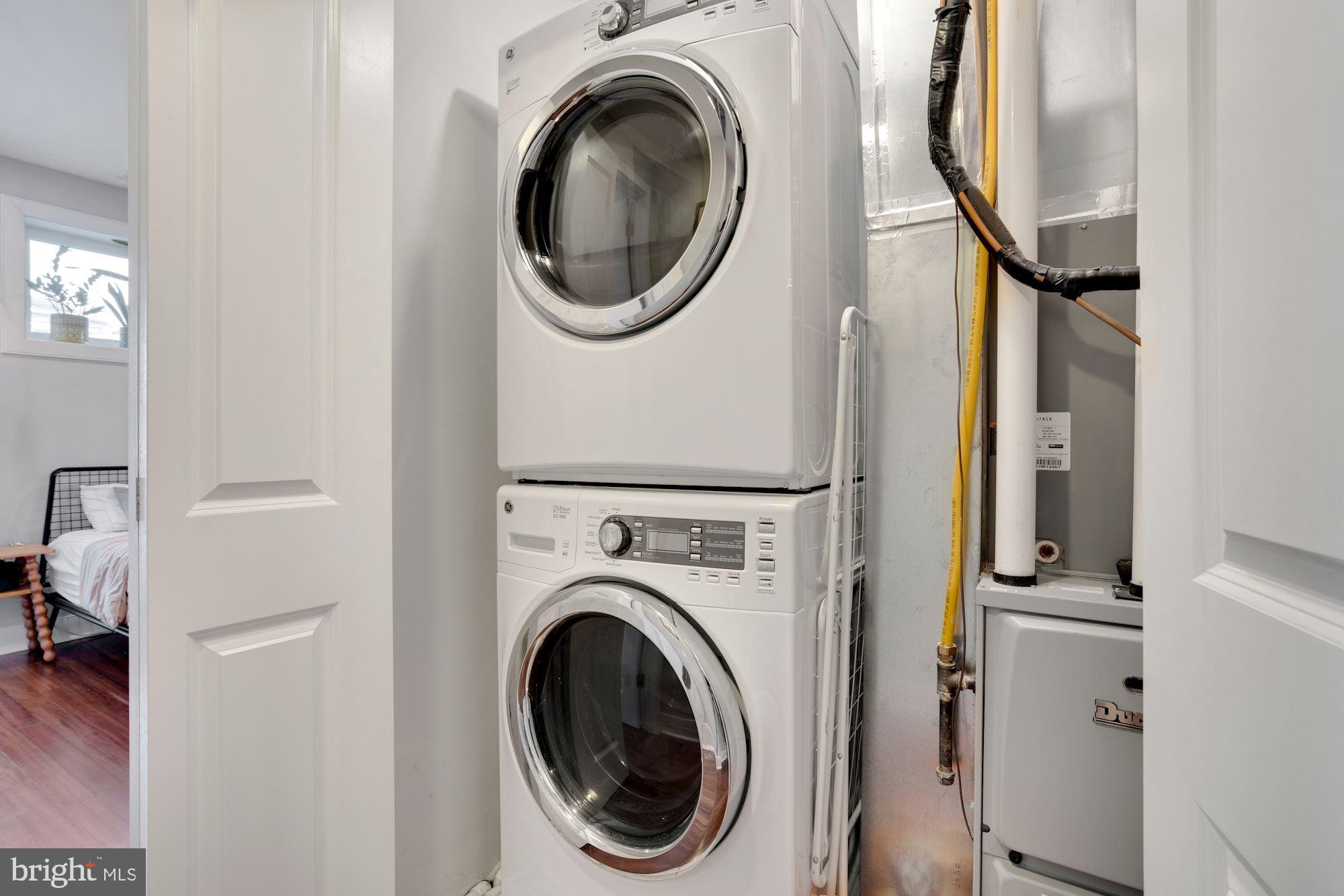 3545 13th Street Northwest, Unit 1 Washington, DC 20010 - Photo 29 of 36 Stacked washer and dryer in unit