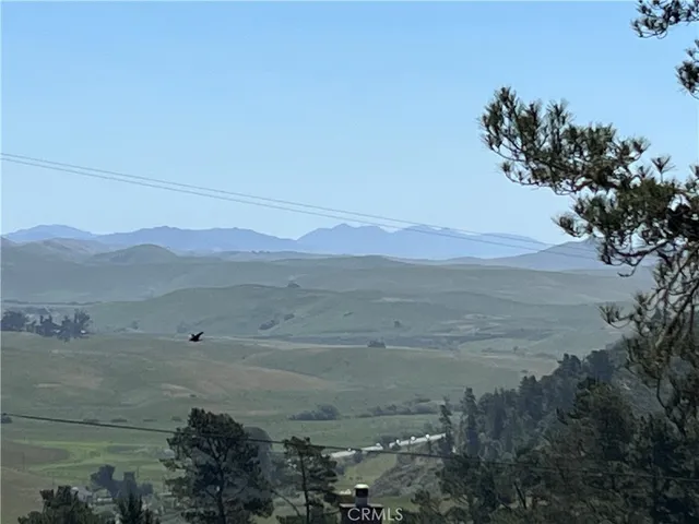 a view of mountain with lake view