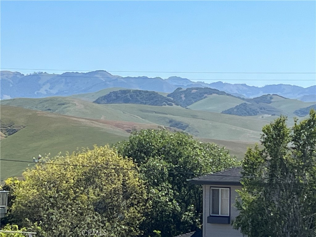 35 Spencer Street Cambria, CA 93428 - Photo 3 of 7 a view of lake with mountain