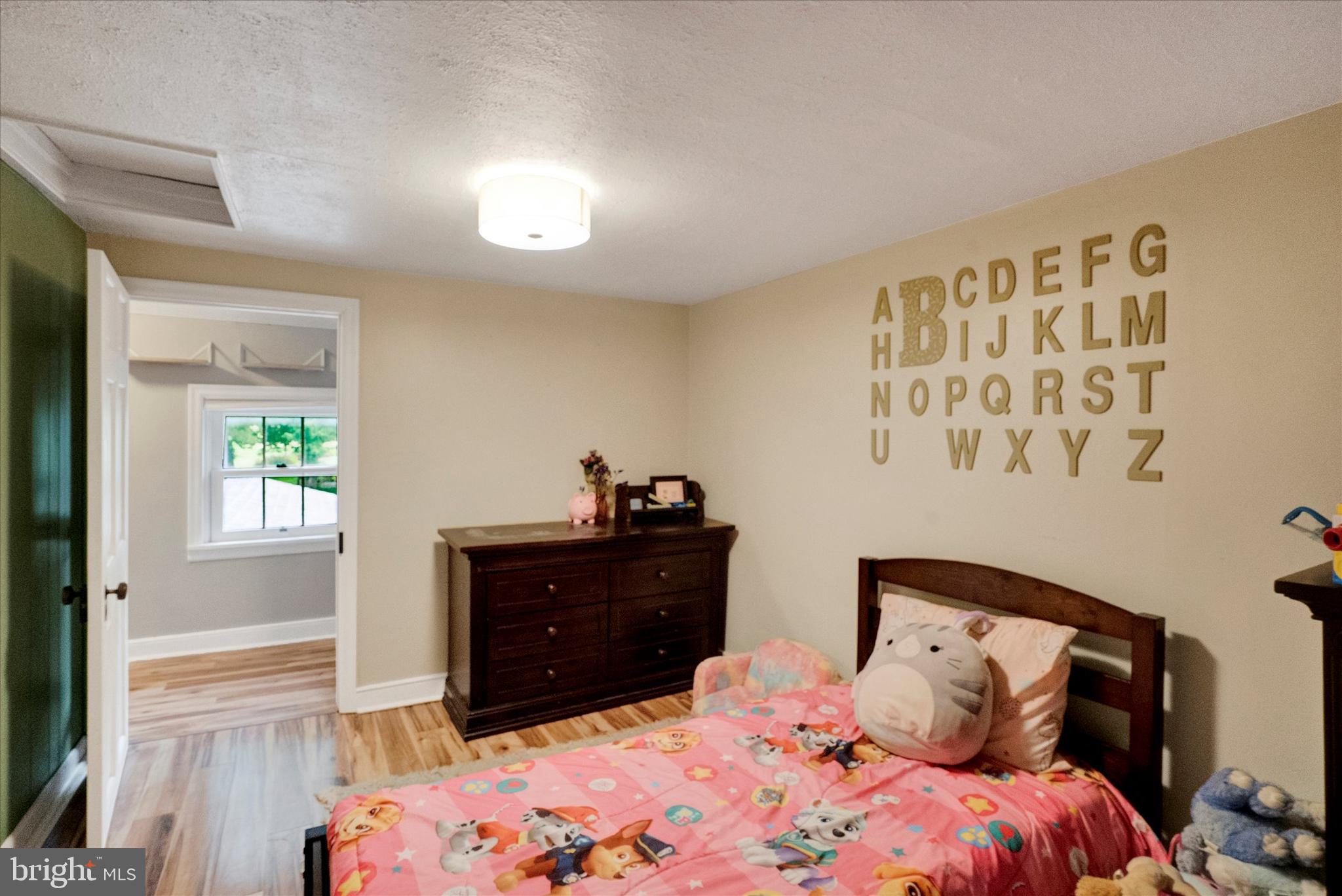 53 Main Street Oley, PA 19547 - Photo 25 of 26 a bedroom with a bed and a window