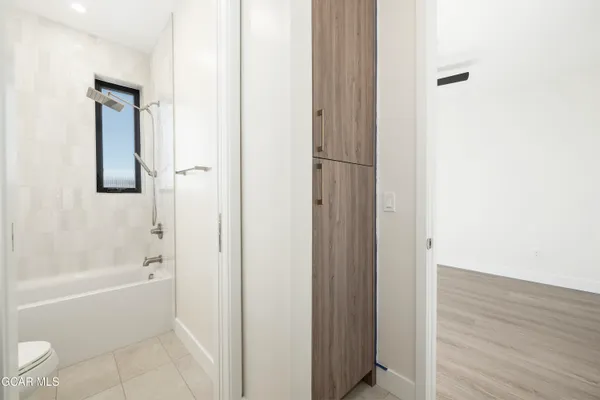 a bathroom with a sink and a shower