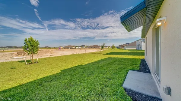 a view of a golf course with a garden