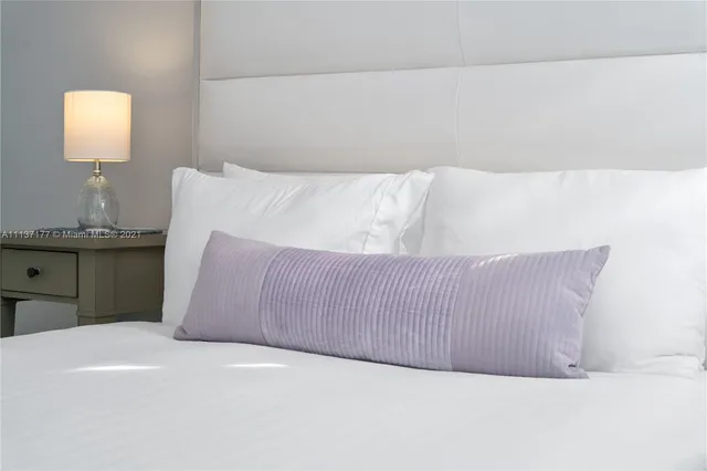 a view of a vase of flowers sitting on a table