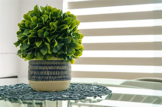 a view of a living room and wooden floor