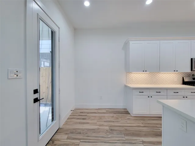 a view of backyard with green space