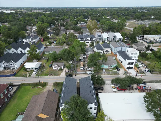 an aerial view of a house with a garden