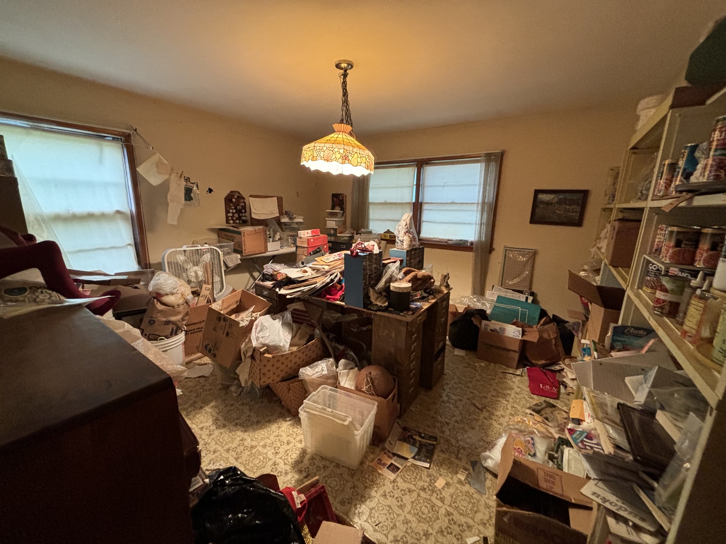 3440 Green Street Steger, IL 60475 - Photo 6 of 9 a living room with lots of furniture and a chandelier