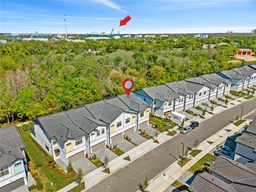 an aerial view of a house with a garden