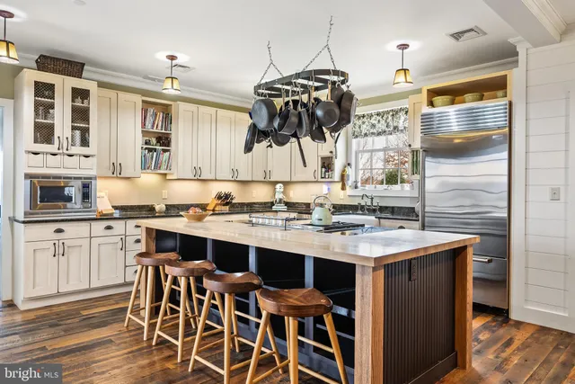 a view of a hallway with the wooden floor