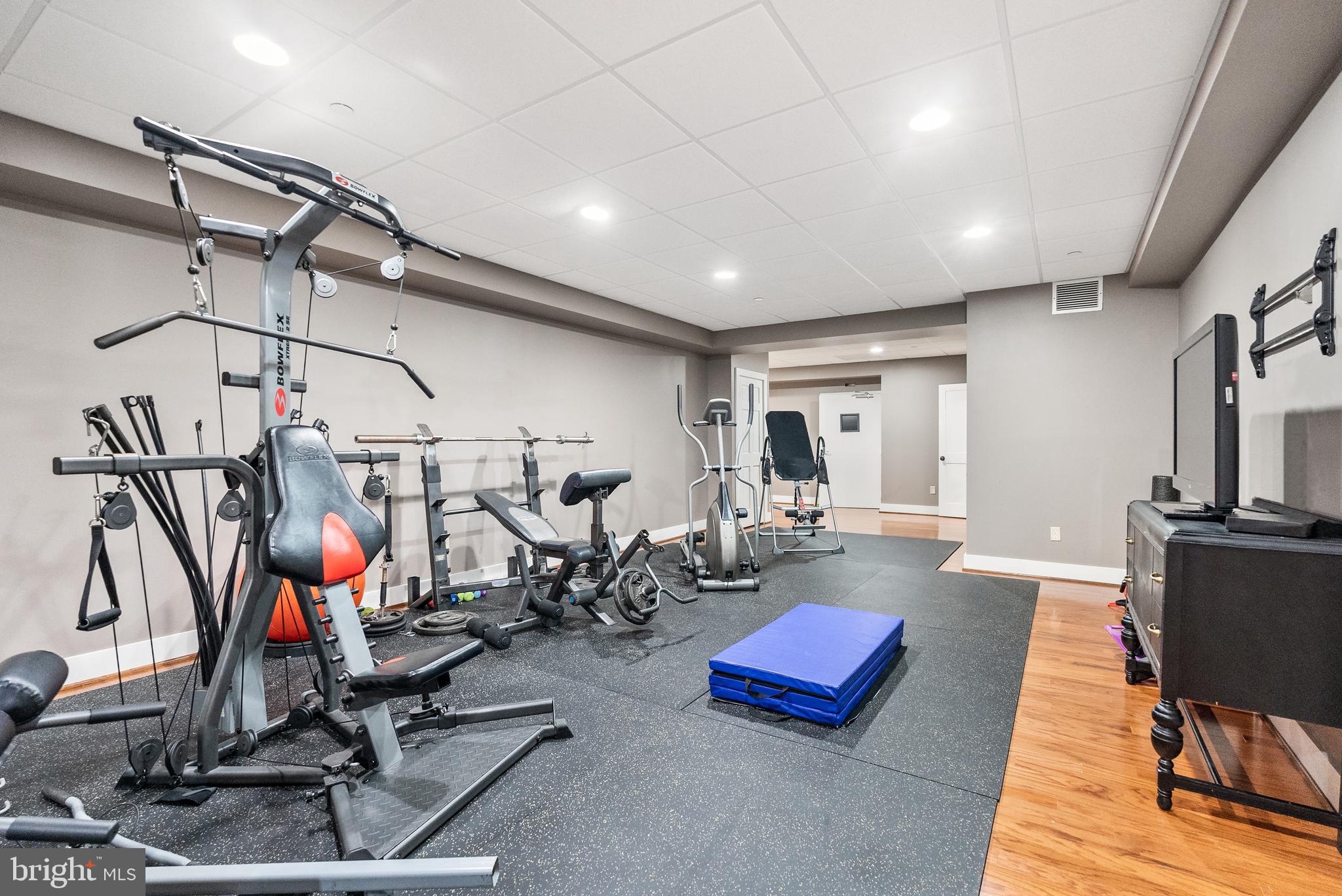 21100 West Offutt Road Poolesville, MD 20837 - Photo 24 of 58 Lower level recreation room used as a home gym