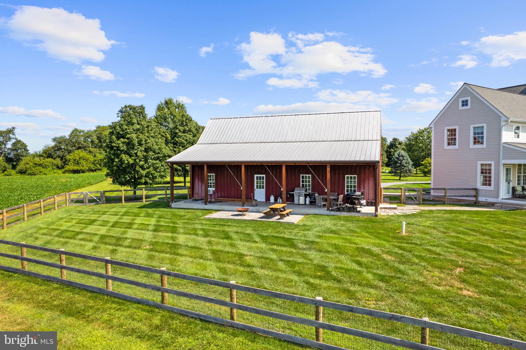 21100 West Offutt Road Poolesville, MD 20837 - Photo 29 of 58 Covered backside of garage with slate patio