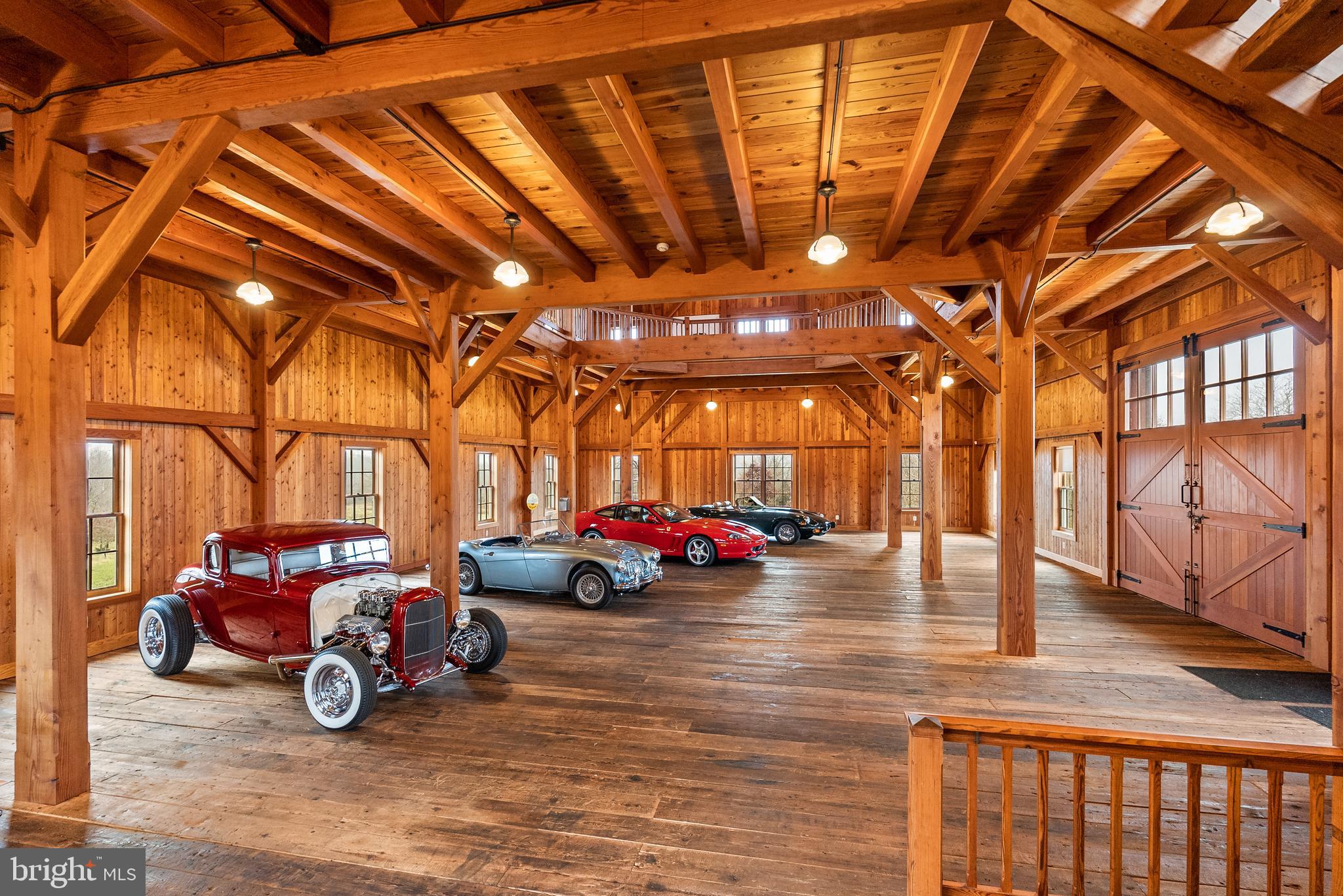 21100 West Offutt Road Poolesville, MD 20837 - Photo 3 of 58 a view of a cars is parked in a parking area