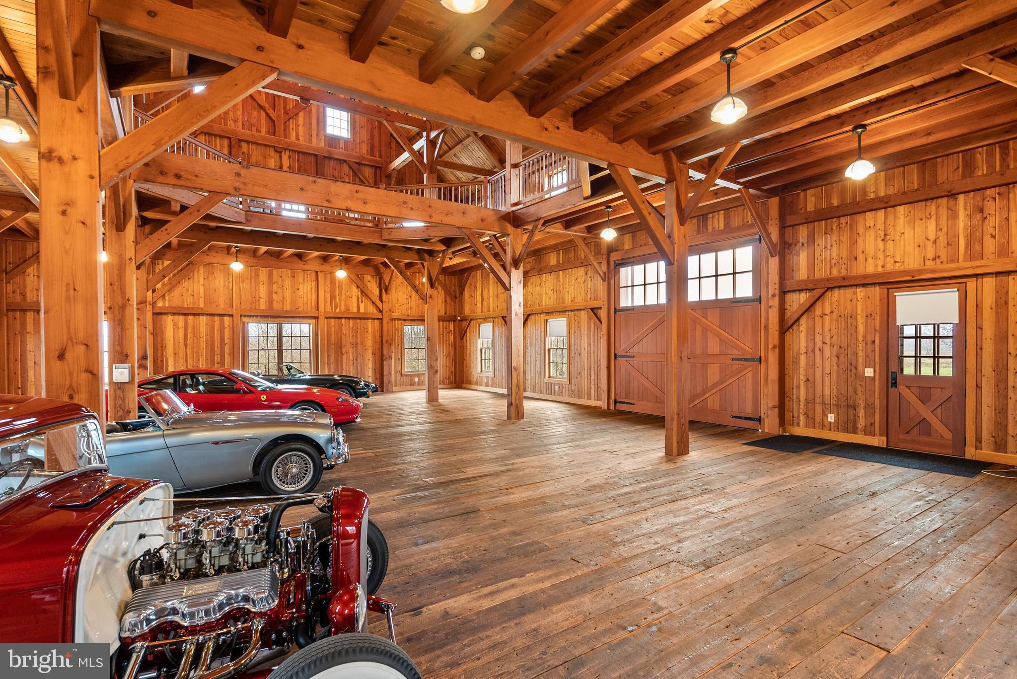 21100 West Offutt Road Poolesville, MD 20837 - Photo 33 of 58 Reclaimed wood floor and 15' ceiling height