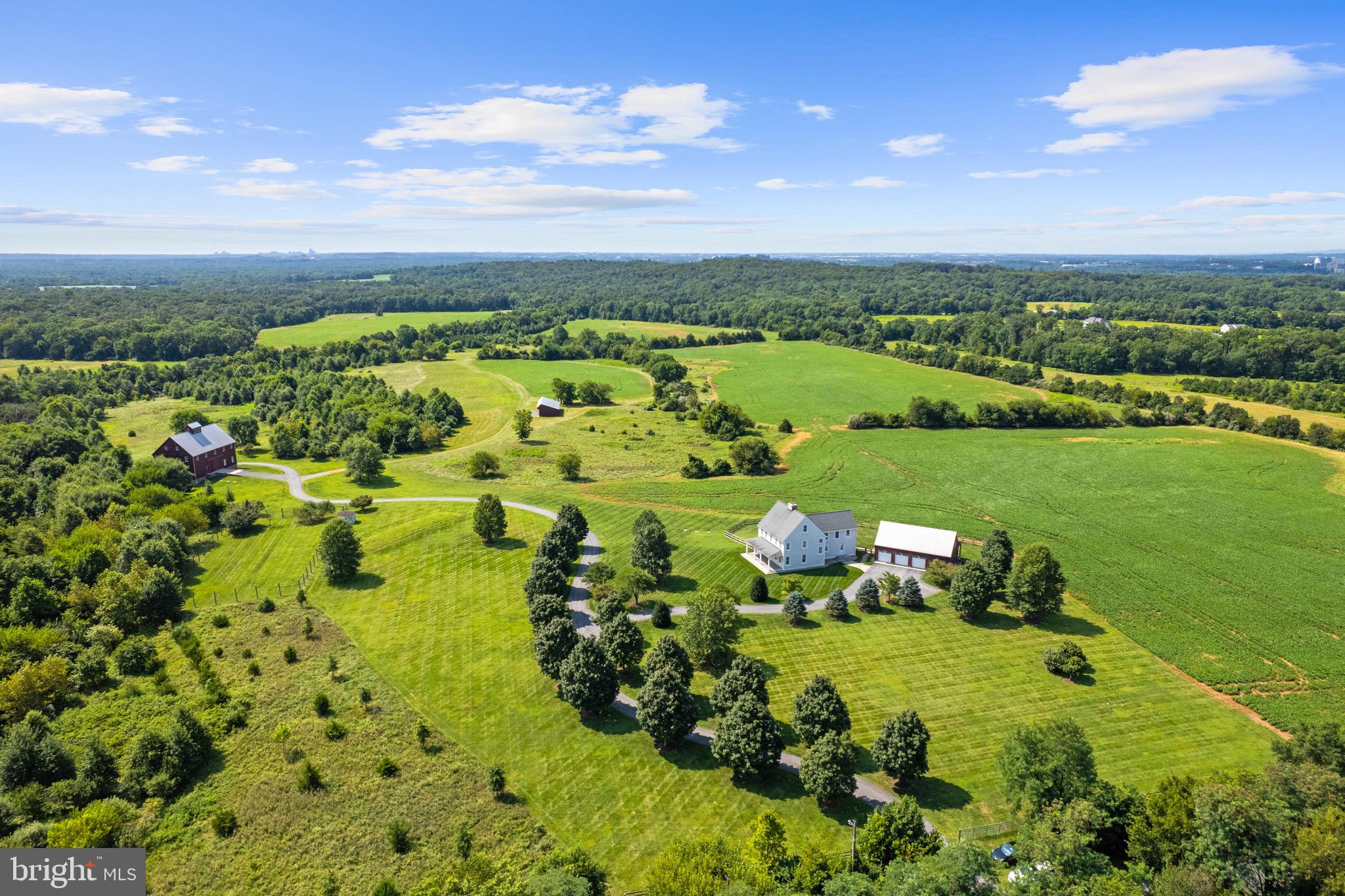 21100 West Offutt Road Poolesville, MD 20837 - Photo 51 of 58 a view of a lake with a city