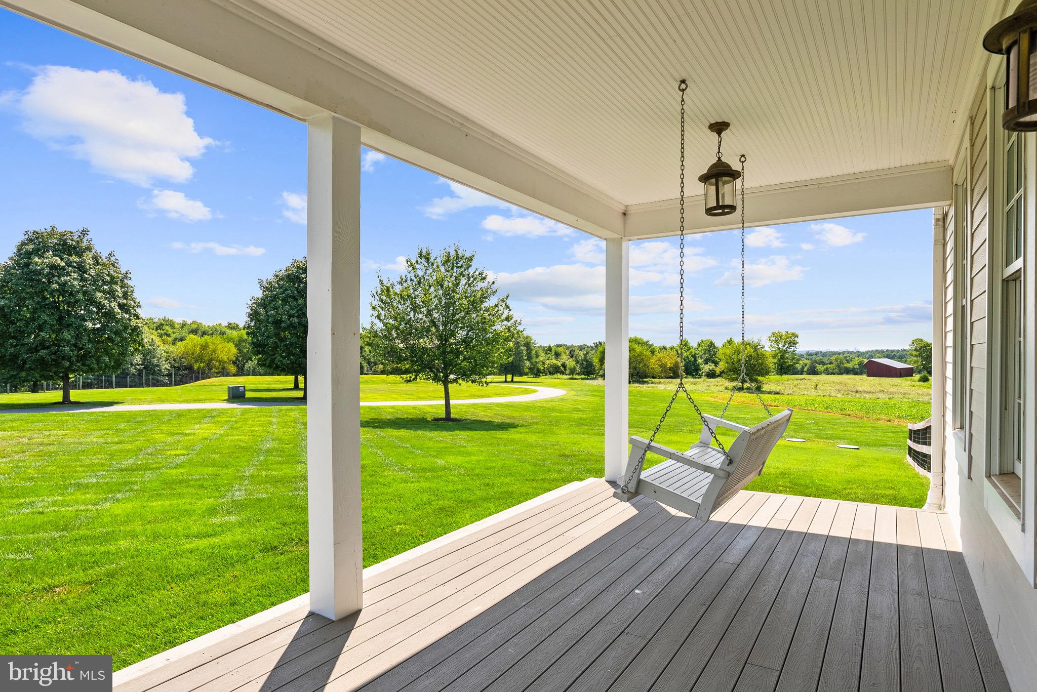 21100 West Offutt Road Poolesville, MD 20837 - Photo 10 of 58 Inviting porch for those warm summer nights