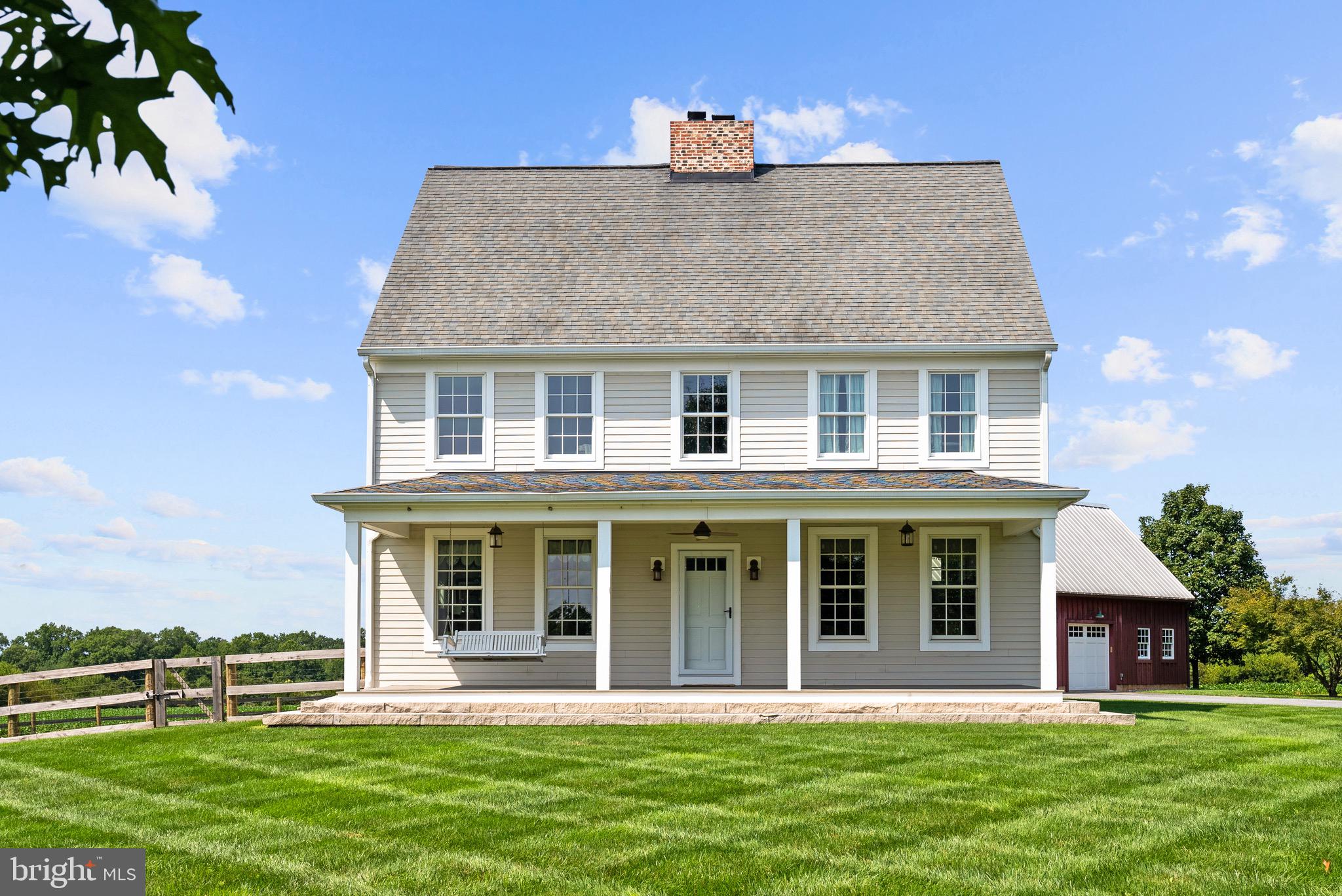 21100 West Offutt Road Poolesville, MD 20837 - Photo 10 of 58 front view of a house with a yard