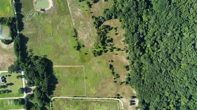 a view of a lush green field