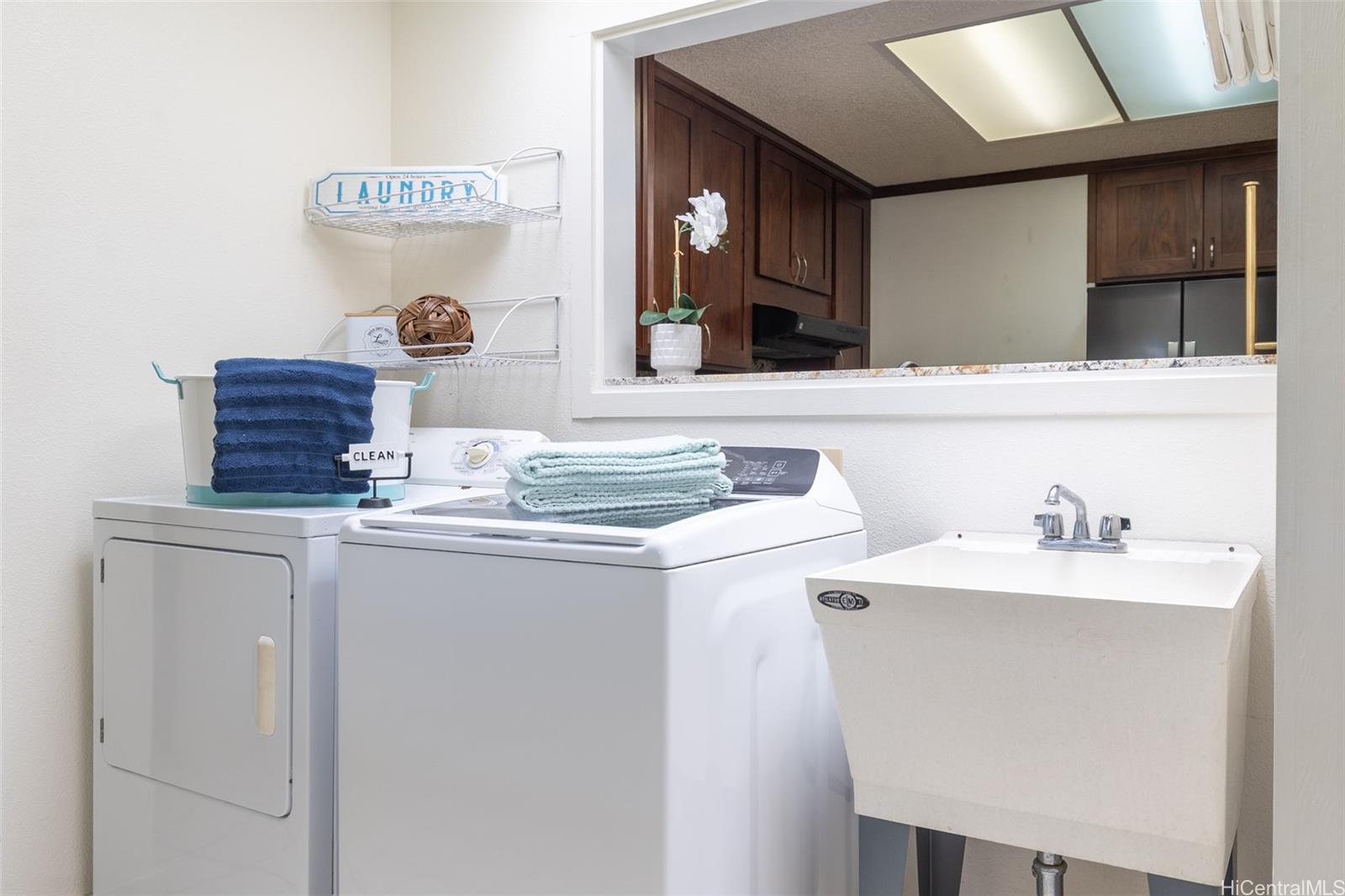 176 Kuulei Road Kailua, HI 96734 - Photo 14 of 25 Interior laundry area with full size washer and dryer.