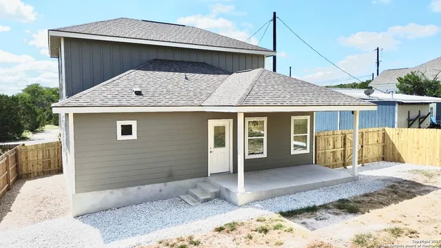a view of a house with a roof deck