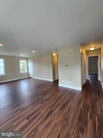 a bathroom with a sink a mirror and a shower