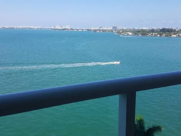 a view of a lake with a city view