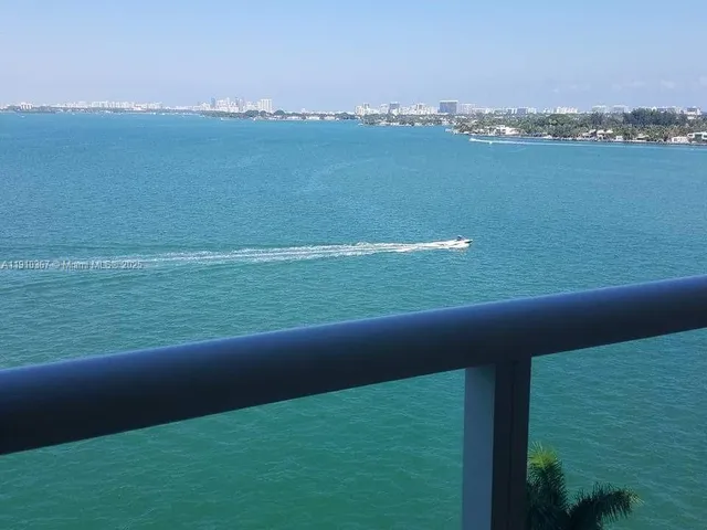 a view of a lake with a city view