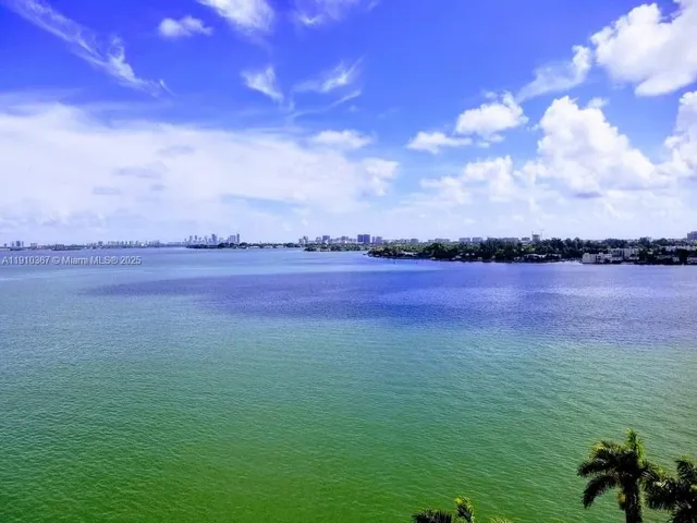 a view of a lake from a balcony