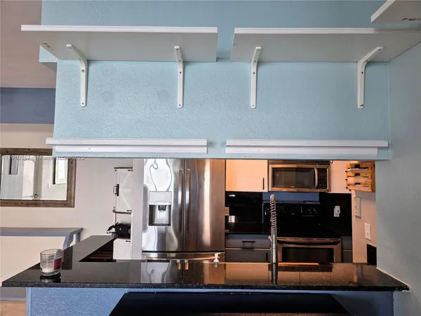 a room with a bed and a window