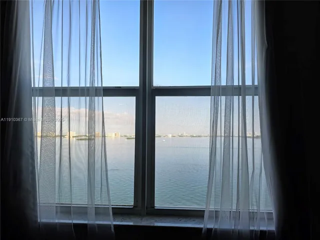 a bathroom with a toilet a sink and a bathtub