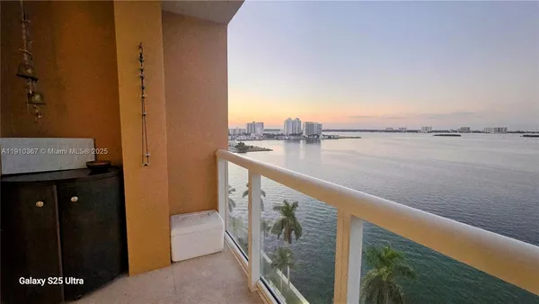 a view of a lake from a balcony