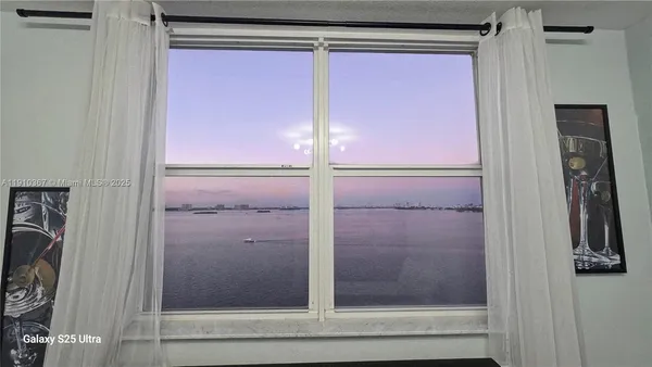 a view of a city with tall buildings