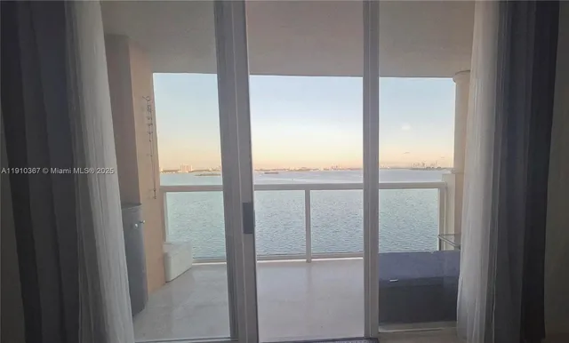 a view of a livingroom with wooden floor