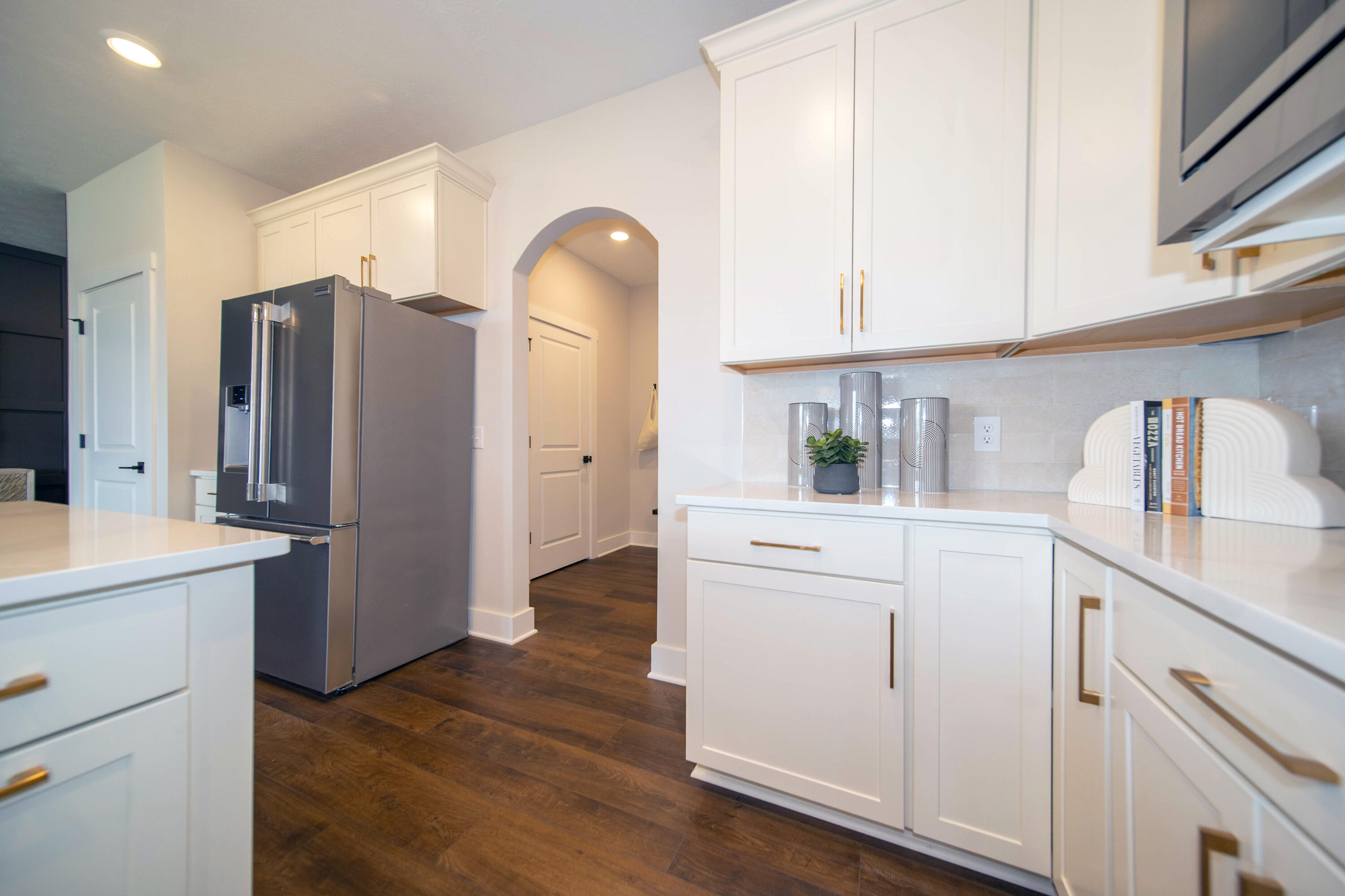 9382 Michigan Drive Crown Point, IN 46307 - Photo 11 of 23 a kitchen with cabinets and stainless steel appliances