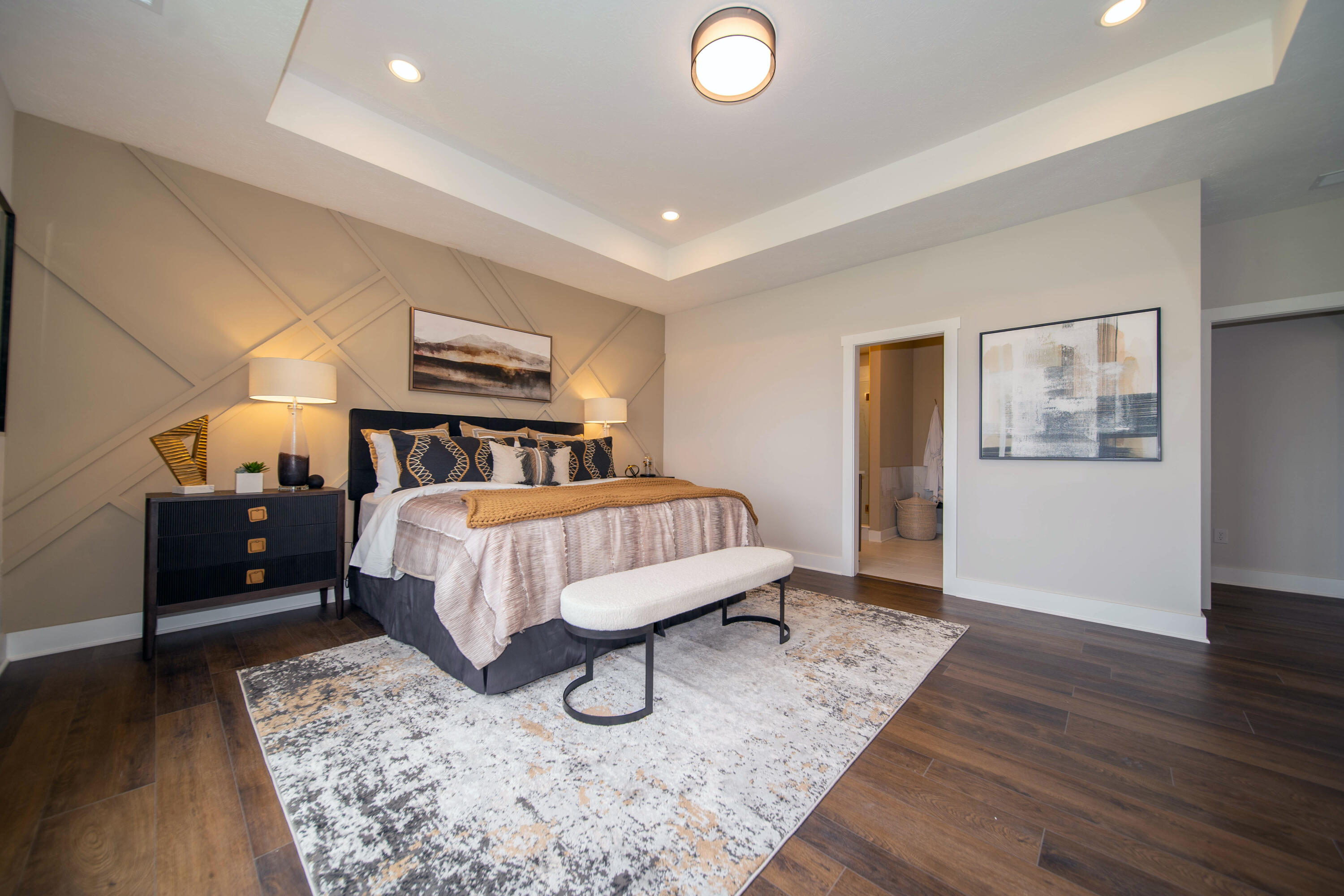 9382 Michigan Drive Crown Point, IN 46307 - Photo 15 of 23 a bedroom with a bed and wooden floor