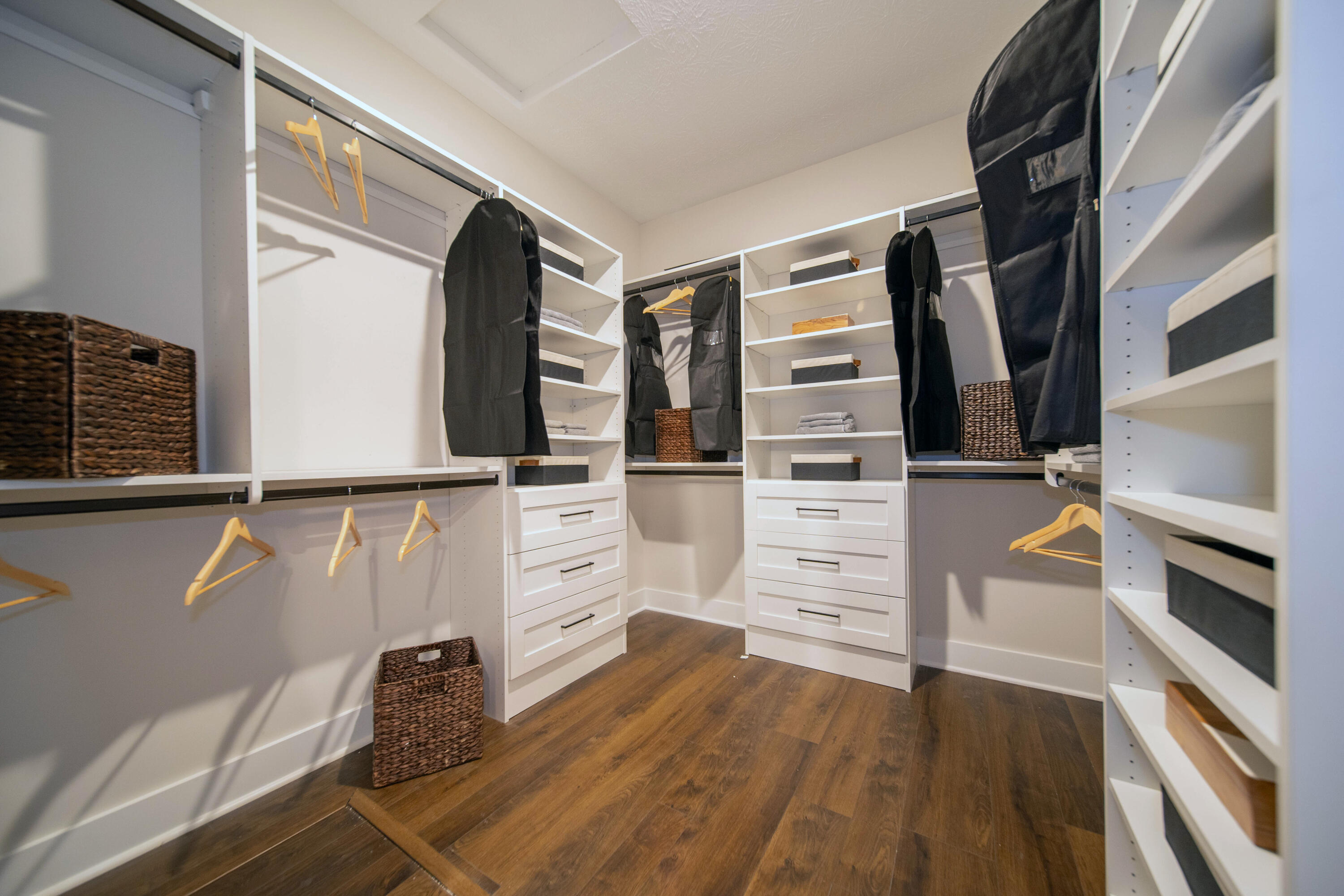 9382 Michigan Drive Crown Point, IN 46307 - Photo 16 of 23 a view of walk in closet with clothes and shoes