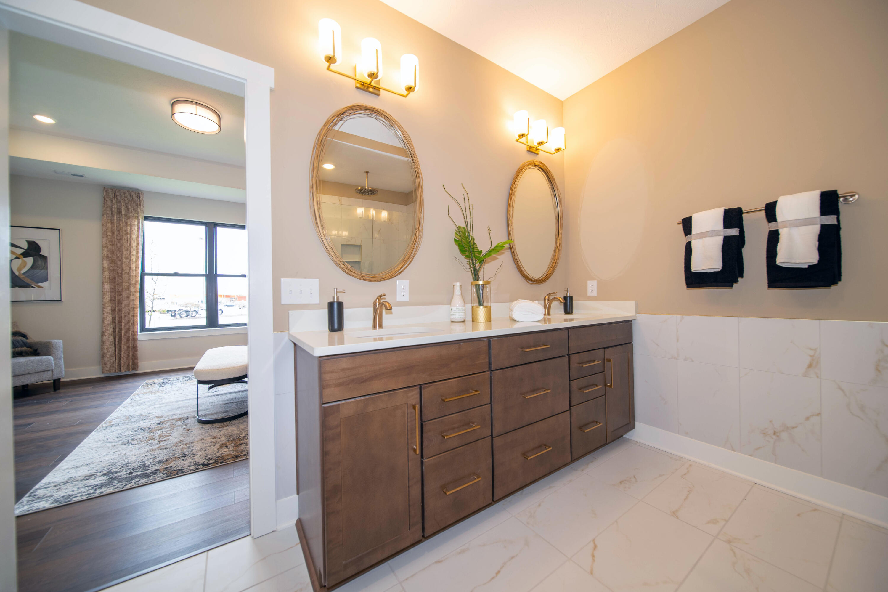 9382 Michigan Drive Crown Point, IN 46307 - Photo 18 of 23 a bathroom with a double vanity sink and a mirror