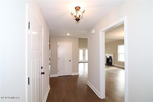 116 Hawks Ridge Byron, GA 31008 - Photo 4 of 34 a view of a hallway with wooden floor