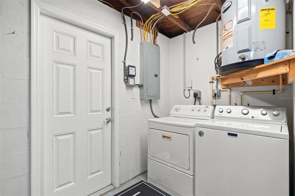 3709 Panola Drive New Port Richey, FL 34652 - Photo 22 of 36 a utility room with dryer and washer