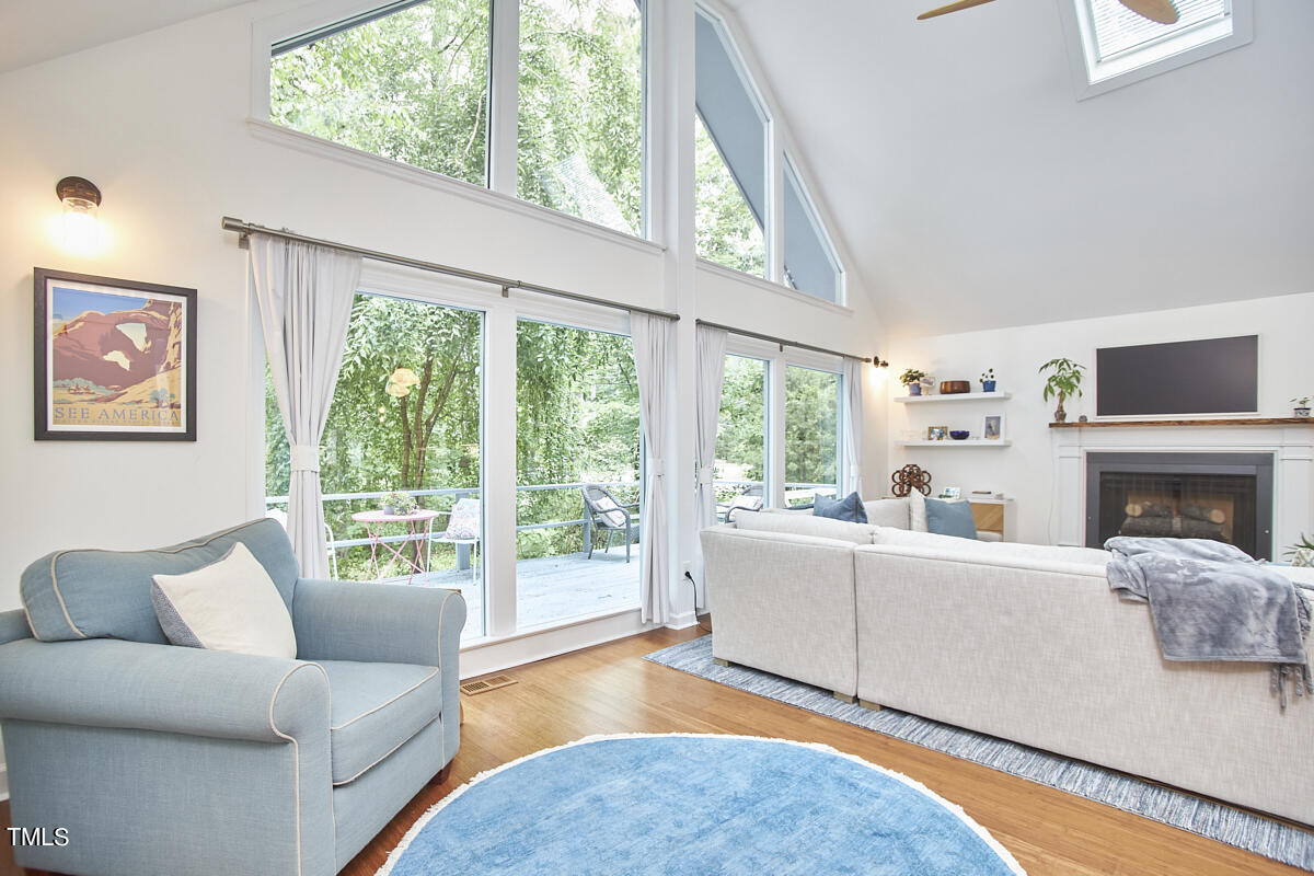 2803 McDowell Road Durham, NC 27705 - Photo 12 of 81 a living room with furniture a large window with outer view