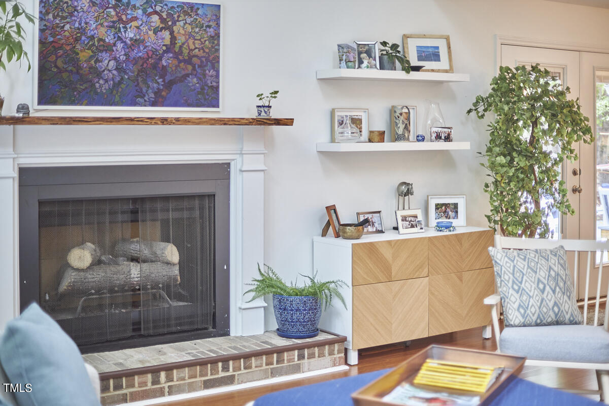2803 McDowell Road Durham, NC 27705 - Photo 17 of 81 a living room with furniture and a fireplace
