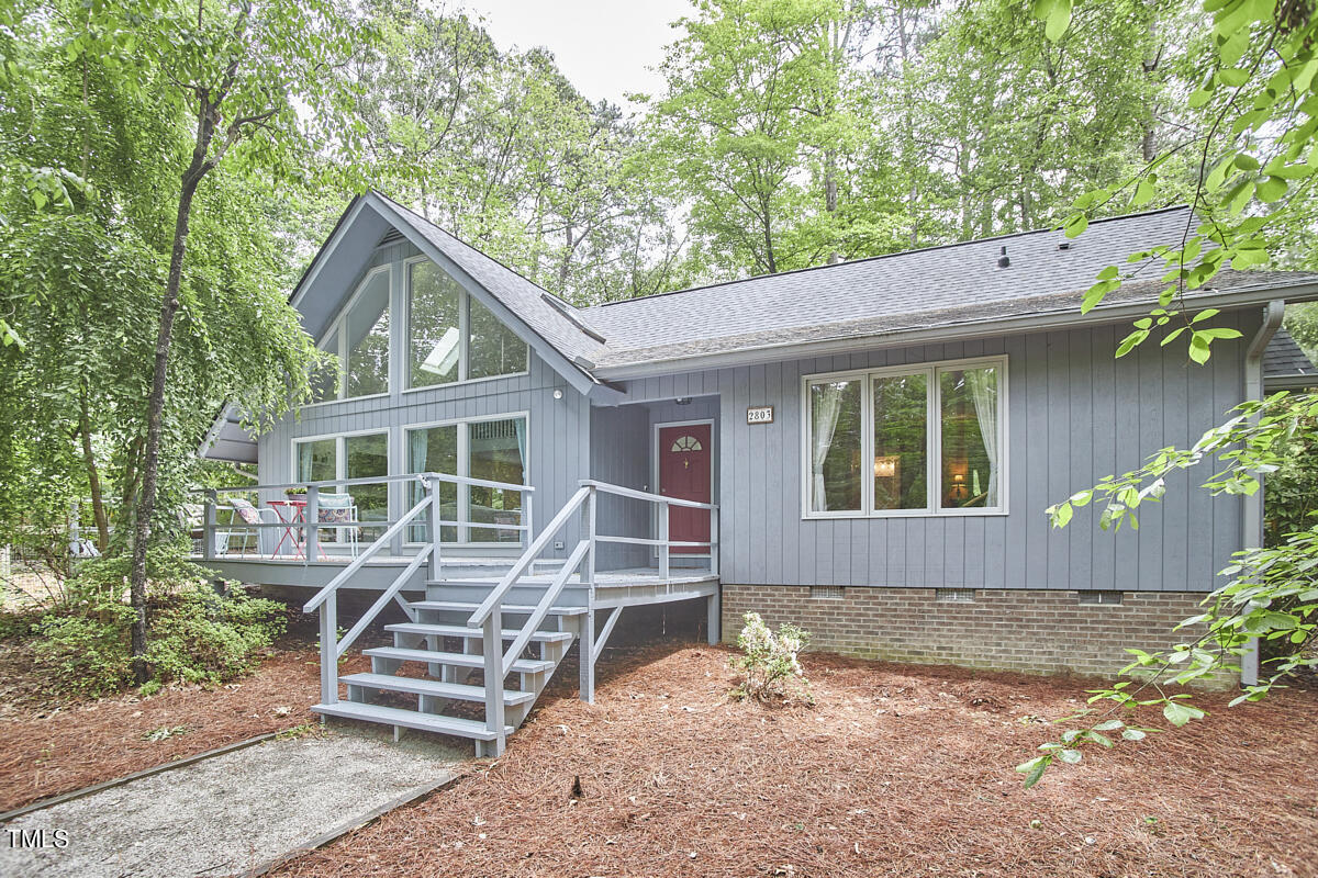 2803 McDowell Road Durham, NC 27705 - Photo 3 of 81 a front view of a house with garden