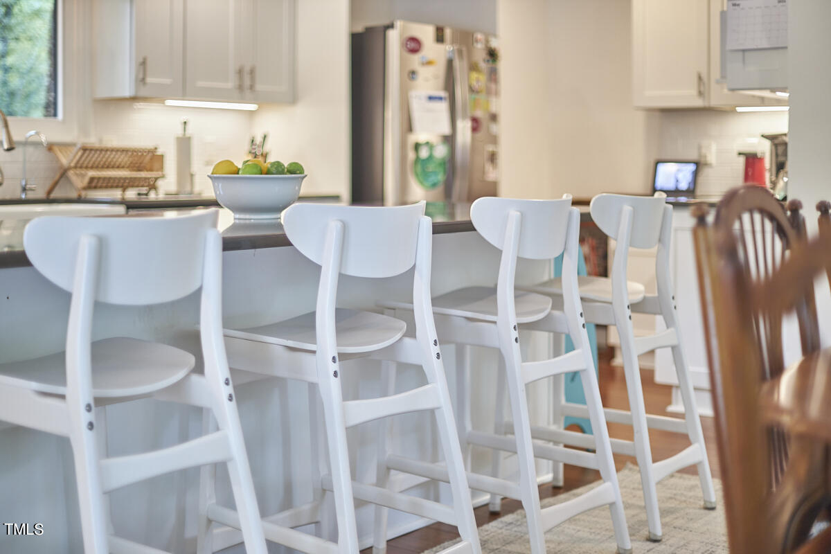 2803 McDowell Road Durham, NC 27705 - Photo 33 of 81 a view of a dining room with furniture and wooden floor