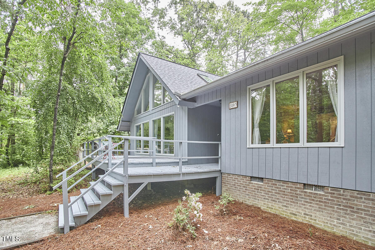 2803 McDowell Road Durham, NC 27705 - Photo 4 of 81 a house with trees in front of it