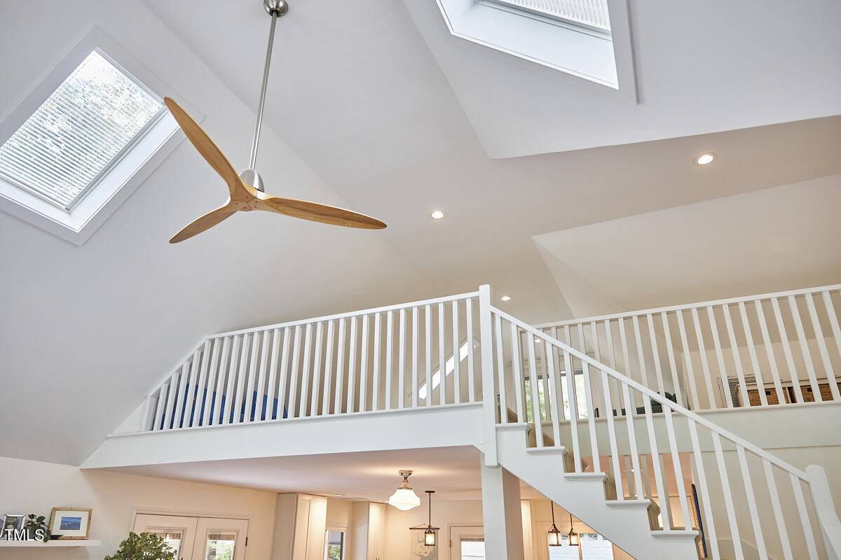 2803 McDowell Road Durham, NC 27705 - Photo 52 of 81 a view of staircase with white walls and a window