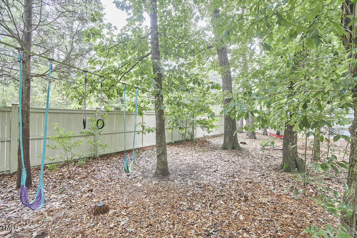 2803 McDowell Road Durham, NC 27705 - Photo 73 of 81 a backyard of a house with lots of green space