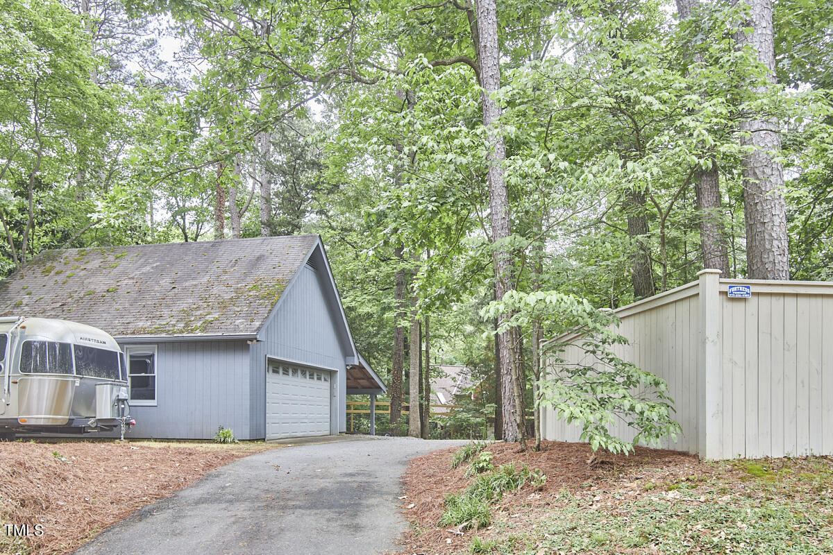 2803 McDowell Road Durham, NC 27705 - Photo 77 of 81 a view of a house with a tree in the background