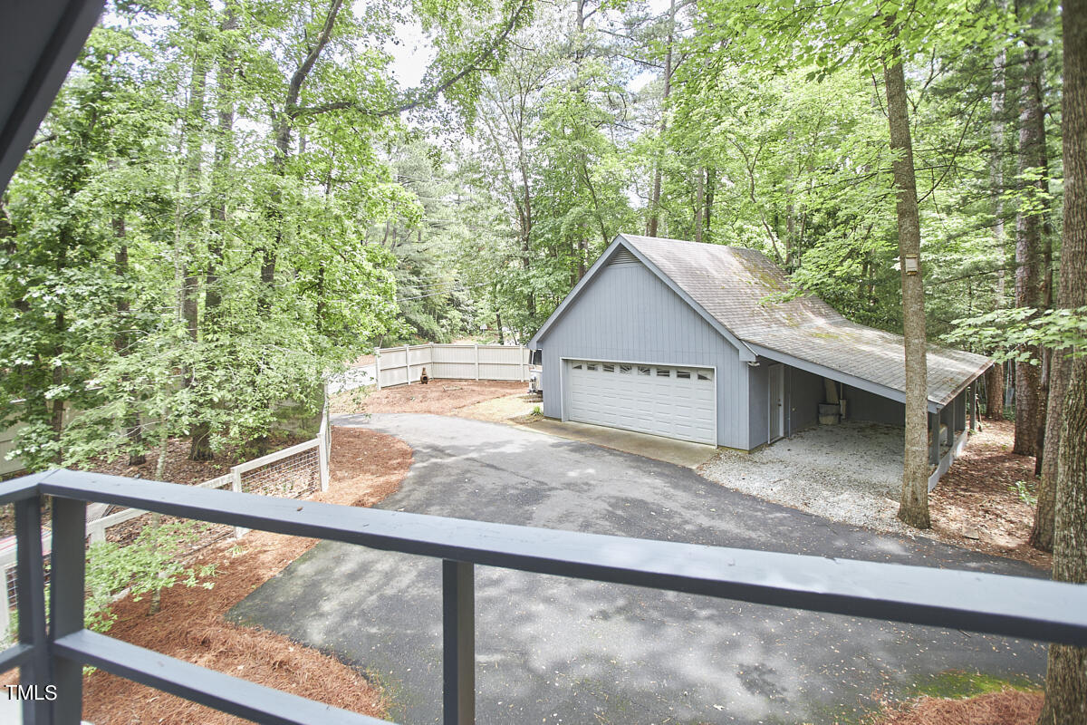 2803 McDowell Road Durham, NC 27705 - Photo 78 of 81 a view of a house with a tree in the background