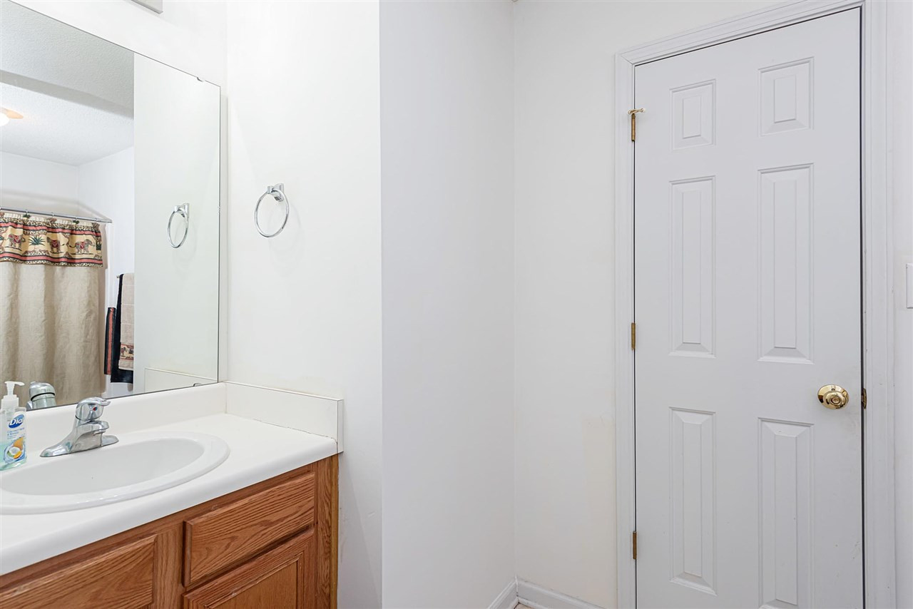 6839 Paint Rock Lane Raleigh, NC 27610 - Photo 17 of 22 upstairs bathroom